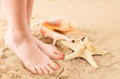 Feets and beach sand
