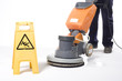 cleaning floor with machine