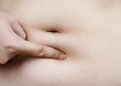 Stomach fat woman body part.