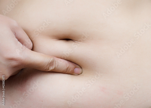 Photo: Stomach fat woman body part. Stomach fat woman body part.