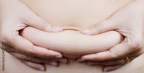 Photo: Stomach fat woman body part. Stomach fat woman body part.