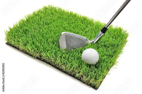 Photo: golf club and ball golf club and ball