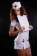 Photo: Pretty medical nurse with a folder Pretty medical nurse with a folder
