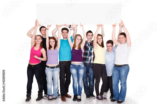 Photo: Large group with a banner Large group with a banner