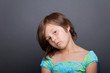 portrait of a caucasian girl against grey background