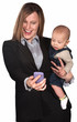 Photo: Businesswoman and Baby Look at Phone Businesswoman and Baby Look at Phone