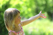 Beautiful little girl crying on the nature