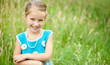 Cute little girl  on the meadow