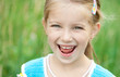 Cute little girl  on the meadow