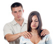 Man consoling his sad girlfriend isolated on white
