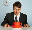 Photo: Businessman drinking a very strong and hot coffee Businessman drinking a very strong and hot coffee