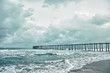Photo: Old jetty over the stormy sea Old jetty over the stormy sea