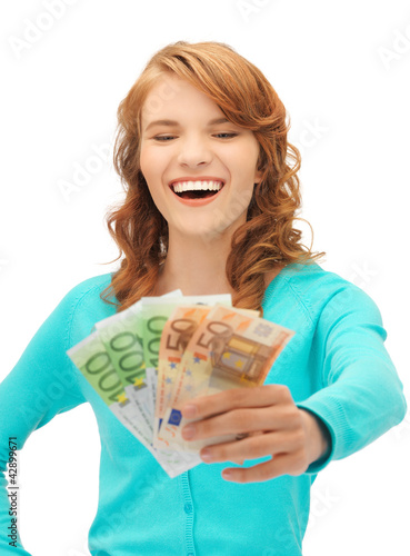 Photo: happy teenage girl with euro cash money happy teenage girl with euro cash money