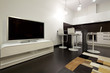 Interior of designer living room with kitchen