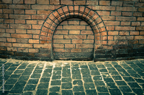 Photo: old grunge interior with brick wall old grunge interior with brick wall