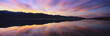 Photo: Panoramic view at sunset of flooded salt flats and Panamint Range Mountains in Death Valley National Park, California Panoramic view at sunset of flooded salt flats and Panamint Range Mountains in Death Valley National Park, California