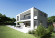 Modern villa with terrace and garden.