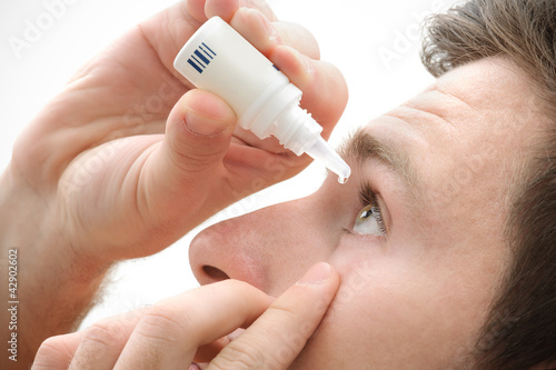 Photo: Dripping eye with eyes drops Dripping eye with eyes drops