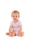 Photo: Happy baby girl sitting between heels Happy baby girl sitting between heels