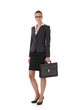 Smiling businesswoman with briefcase