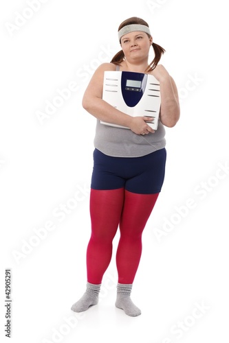 Photo: Plump woman with scale Plump woman with scale