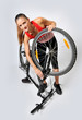 Photo: a woman and a broken bicycle a woman and a broken bicycle