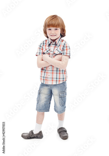 Photo: Little boy posing for the camera Little boy posing for the camera
