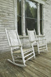 Photo: Rocking chairs on porch of southern house in disrepair along Highway 22 in Central Georgia Rocking chairs on porch of southern house in disrepair along Highway 22 in Central Georgia
