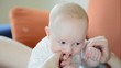 Video: Cute little baby girl playing with her mother and biting fingers Cute little baby girl playing with her mother and biting fingers