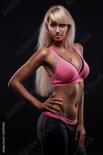 Photo: portrait of young fitness woman portrait of young fitness woman