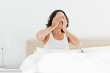Attractive woman rubbing her eyes 