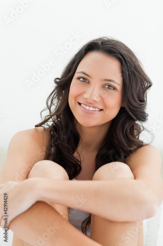 Photo: Close-up of a young brunette in her bed Close-up of a young brunette in her bed