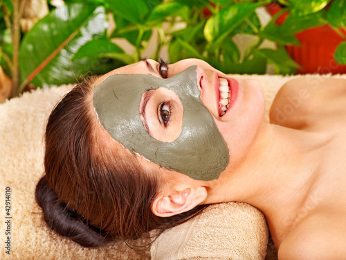 Photo: Woman getting facial massage . Woman getting facial massage .