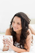 Pretty brunette with a cup of coffee
