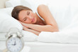 Cute young woman sleeping deeply 