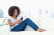 Fuzzy hair woman texting