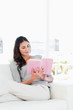 Cute woman with a novel