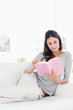 Cute woman turns the pages of a novel