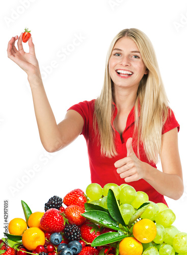 Photo: young beautiful woman with fresh fruits and berries young beautiful woman with fresh fruits and berries