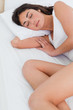 Close-up of a brunette sleeping