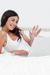 Smiling brunette on a video chat 