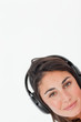 Close-up of a brunette wearing headphones
