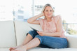 Blonde woman using a touchpad