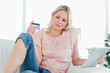 Blonde buying on a touchpad