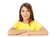 Student girl is sitting and smiling.