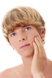 Portrait of young men with hand on the cheek.