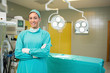 Nurse smiling with arms crossed