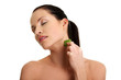 Photo: Young beautiful woman is applying aloe vera. Young beautiful woman is applying aloe vera.