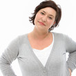 Self-assured middle-aged woman at peace with herself