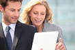 Executives with tablet
